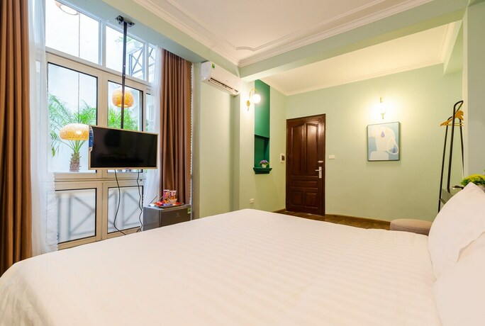 Imagen de la habitación del Hotel Ohana, Hanoi. Foto 24