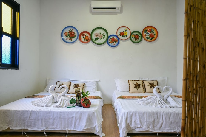 Imagen de la habitación del Hotel Ohana House HQ. Foto 3