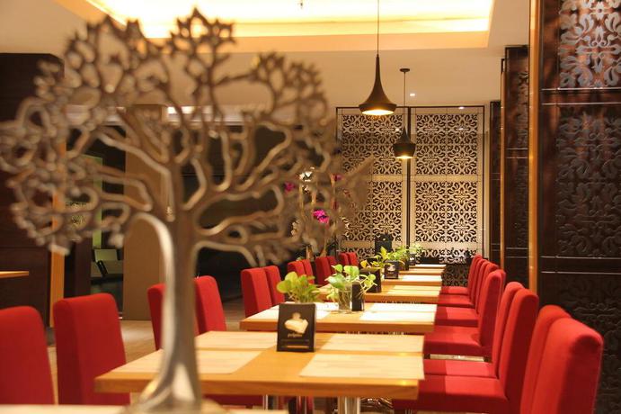 Imagen del bar/restaurante del Hotel Ohana Kuta. Foto 3