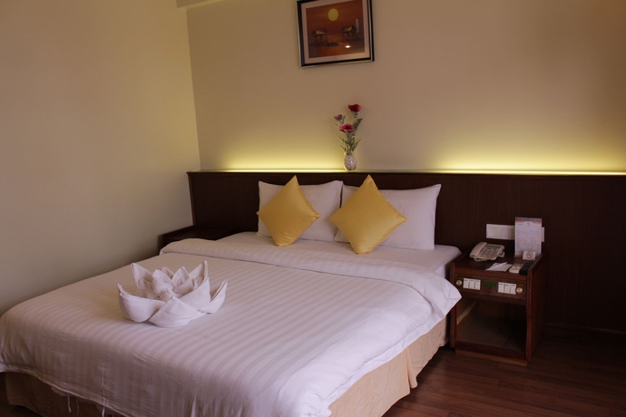 Imagen de la habitación del Hotel Ohana Phnom Penh Palace. Foto 9