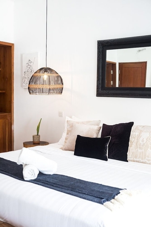 Imagen de la habitación del Hotel Ohana's Beachfront Resort and Beach Club. Foto 15