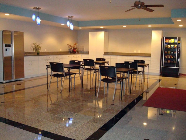 Imagen del bar/restaurante del Hotel O'hare Inn and Suites. Foto 2