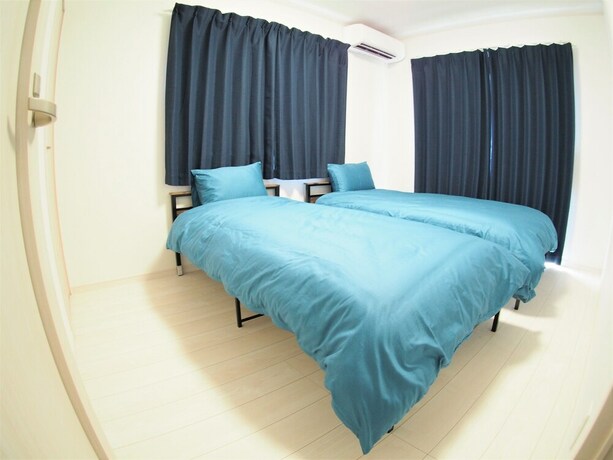 Imagen de la habitación del Hotel Ohayo House. Foto 34