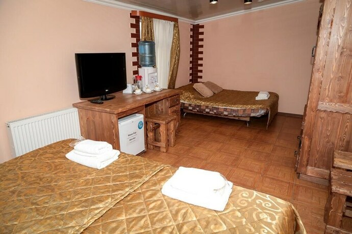 Imagen de la habitación del Hotel Ohotnichia Usadba. Foto 16