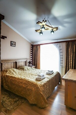 Imagen de la habitación del Hotel Ohotnichia Usadba. Foto 17