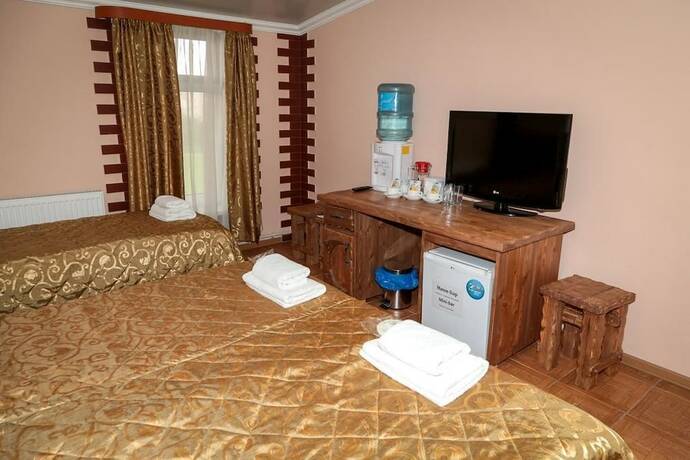 Imagen de la habitación del Hotel Ohotnichia Usadba. Foto 18