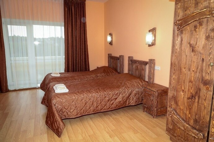 Imagen de la habitación del Hotel Ohotnichia Usadba. Foto 23