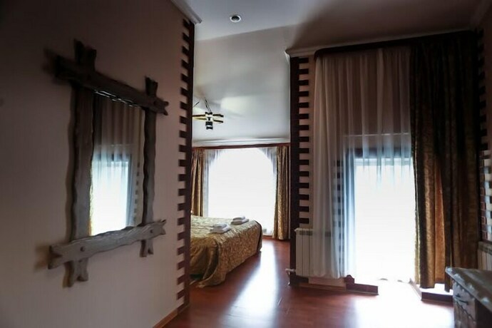 Imagen de la habitación del Hotel Ohotnichia Usadba. Foto 26