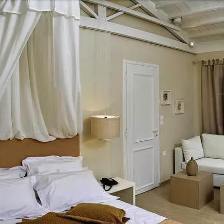 Imagen de la habitación del Hotel Oikies Small Elegant Houses. Foto 13