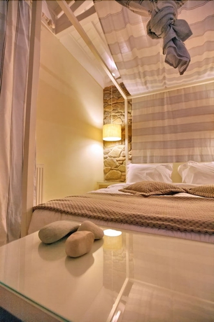 Imagen de la habitación del Hotel Oikies Small Elegant Houses. Foto 16