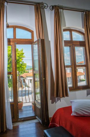 Imagen de la habitación del Hotel Oikoperiigitis. Foto 17