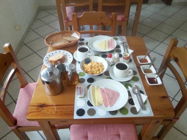 Imagen del bar/restaurante del Hotel Oinoi. Foto 8