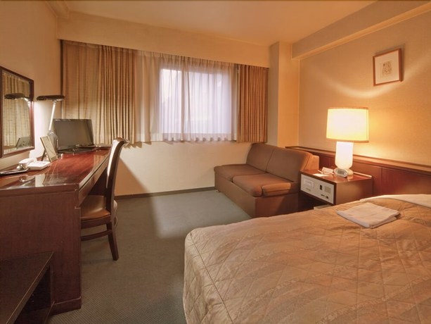 Imagen de la habitación del Hotel Oita Century. Foto 8