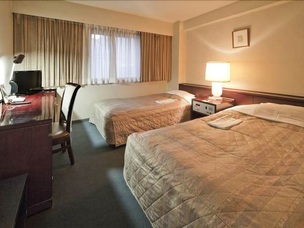 Imagen de la habitación del Hotel Oita Century. Foto 10