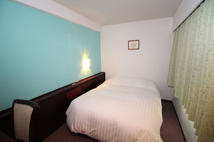 Imagen de la habitación del Hotel Oita Century. Foto 17