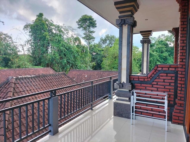 Imagen de la habitación del Hotel Ojeks Homestay. Foto 2