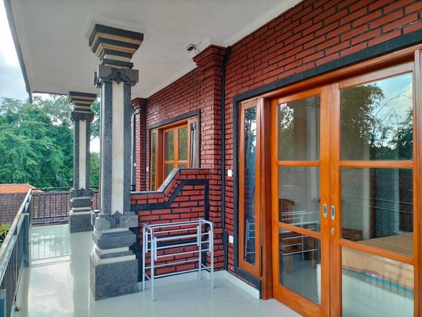 Imagen de la habitación del Hotel Ojeks Homestay. Foto 6