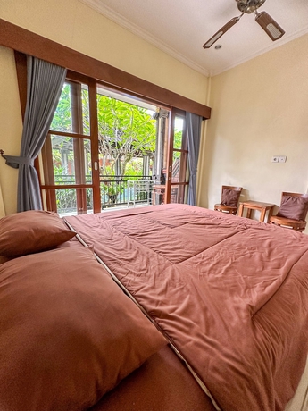 Imagen de la habitación del Hotel Ojeks Homestay. Foto 8