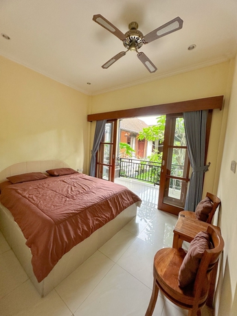 Imagen de la habitación del Hotel Ojeks Homestay. Foto 9