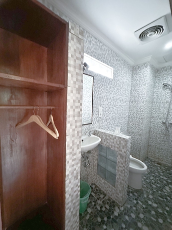 Imagen de la habitación del Hotel Ojeks Homestay. Foto 11