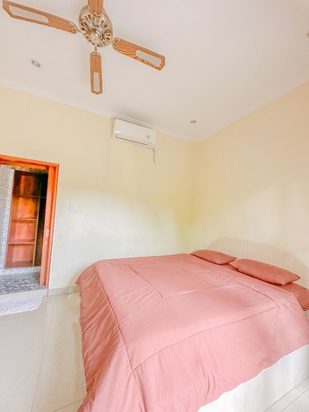 Imagen de la habitación del Hotel Ojeks Homestay. Foto 14