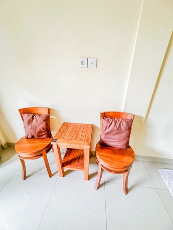Imagen de la habitación del Hotel Ojeks Homestay. Foto 15
