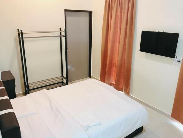 Imagen de la habitación del Hotel Ok Family Villa. Foto 17
