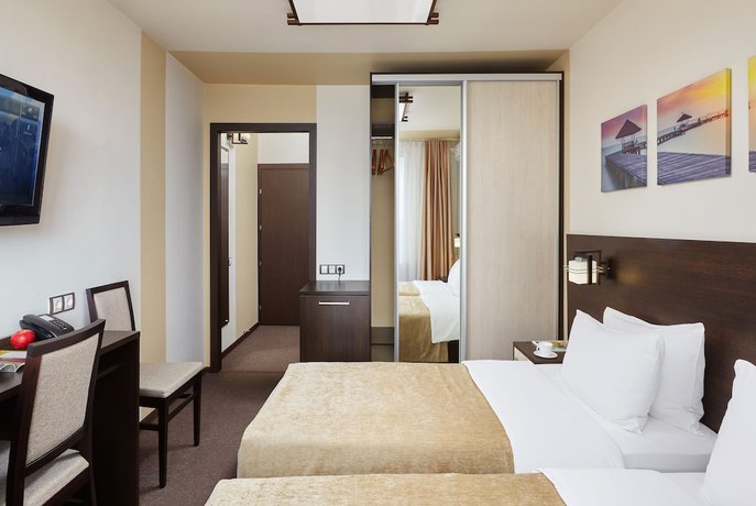 Imagen de la habitación del Hotel Oka Business Grand. Foto 11