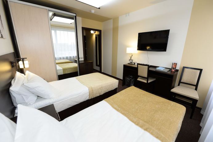 Imagen de la habitación del Hotel Oka Business Grand. Foto 15