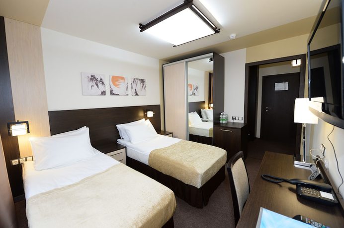 Imagen de la habitación del Hotel Oka Business Grand. Foto 16