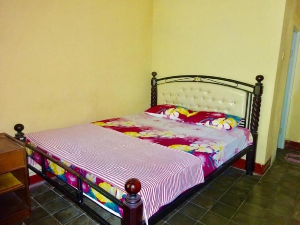 Imagen de la habitación del Hotel Oka Homestay. Foto 2