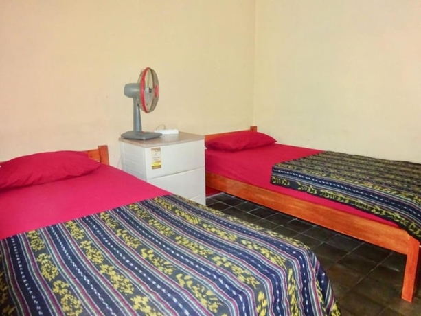 Imagen de la habitación del Hotel Oka Homestay. Foto 3