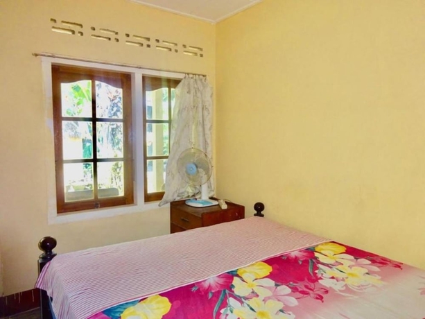 Imagen de la habitación del Hotel Oka Homestay. Foto 4