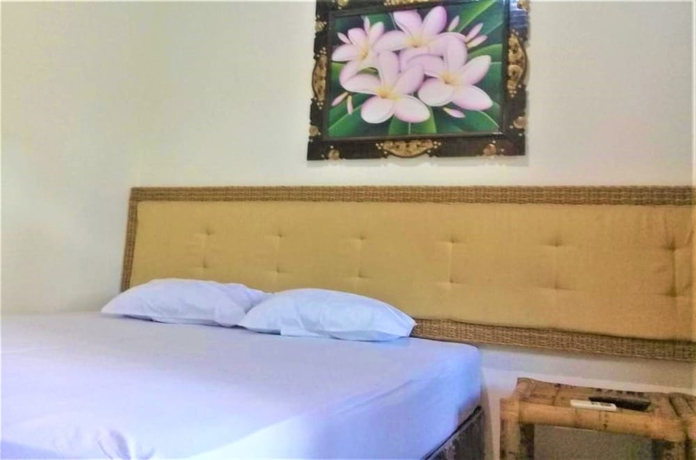 Imagen de la habitación del Hotel Oka Homestay. Foto 5