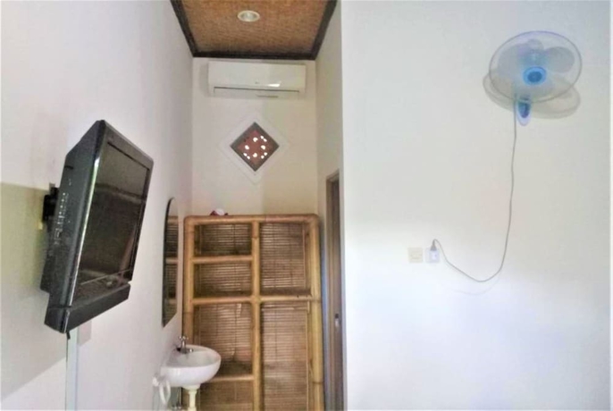 Imagen de la habitación del Hotel Oka Homestay. Foto 6