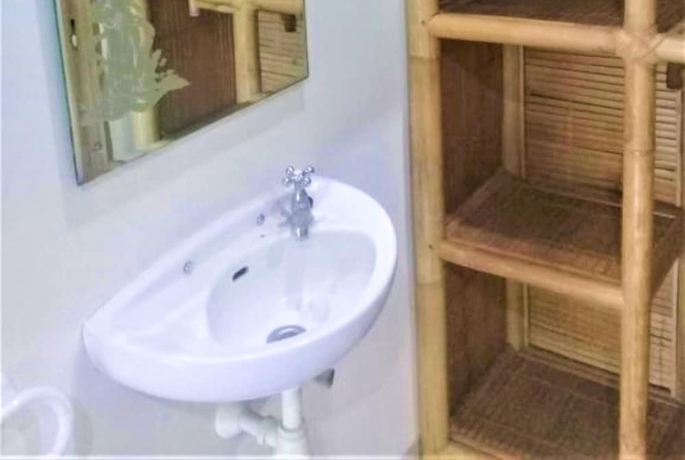 Imagen de la habitación del Hotel Oka Homestay. Foto 7