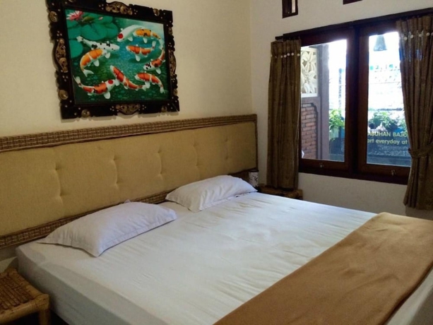 Imagen de la habitación del Hotel Oka Homestay. Foto 8