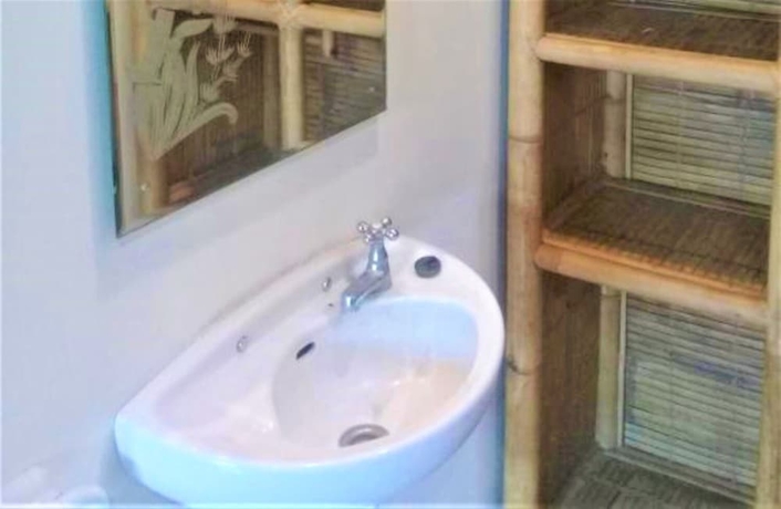 Imagen de la habitación del Hotel Oka Homestay. Foto 10