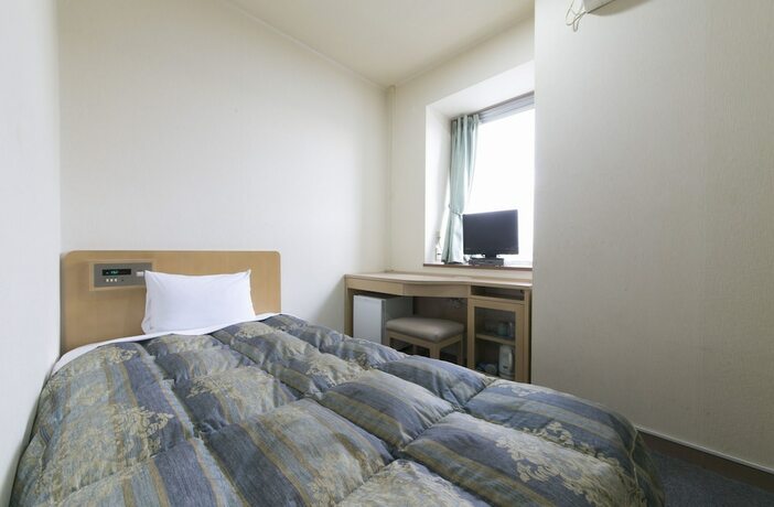 Imagen de la habitación del Hotel Okadaya Toyohashi. Foto 9