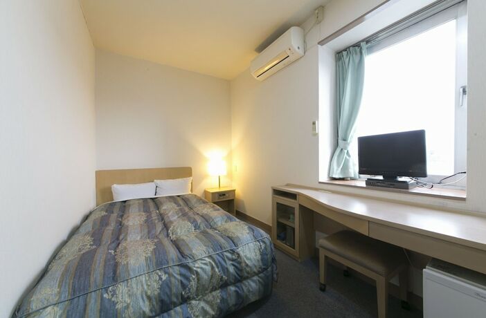 Imagen de la habitación del Hotel Okadaya Toyohashi. Foto 12