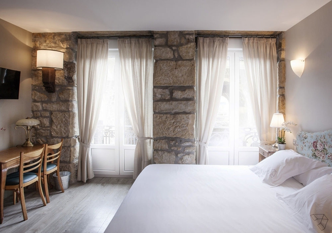 Imagen de la habitación del Hotel Okako. Foto 11