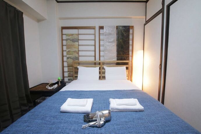 Imagen de la habitación del Hotel Okamura Mansion. Foto 10