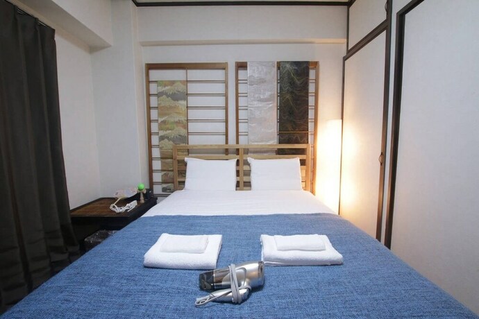 Imagen de la habitación del Hotel Okamura Mansion. Foto 13