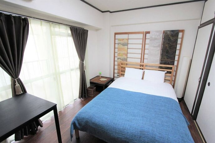 Imagen de la habitación del Hotel Okamura Mansion. Foto 18