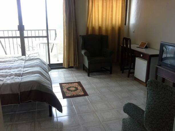Imagen de la habitación del Hotel Okapi, Kigali. Foto 16