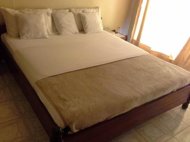 Imagen de la habitación del Hotel Okapi, Kigali. Foto 23