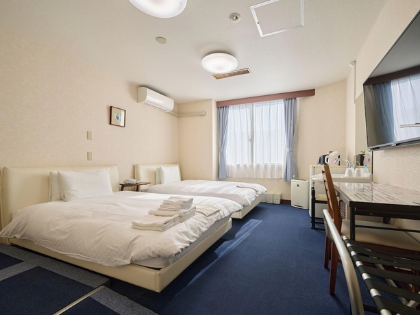 Imagen de la habitación del Hotel Okasan. Foto 6