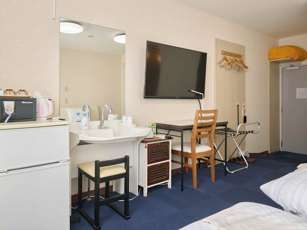 Imagen de la habitación del Hotel Okasan. Foto 7