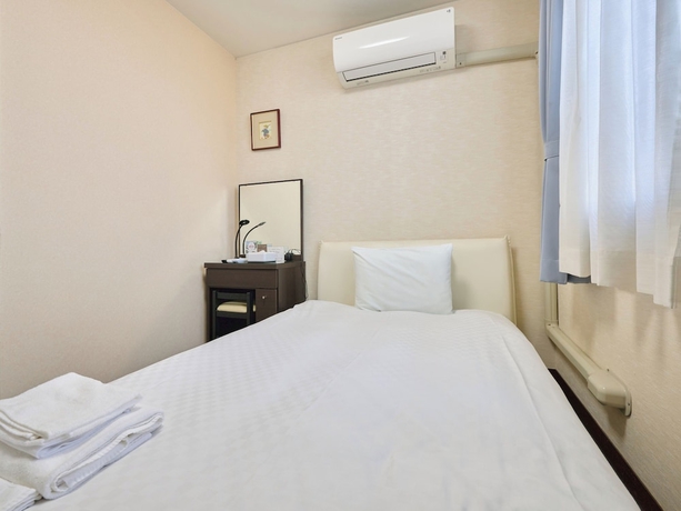 Imagen de la habitación del Hotel Okasan. Foto 9