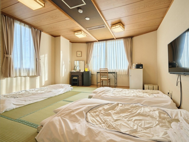 Imagen de la habitación del Hotel Okasan. Foto 11